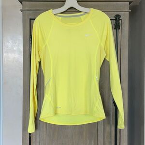 Nike fit dry size small (4-6). Long sleeve tee shirt in yellow